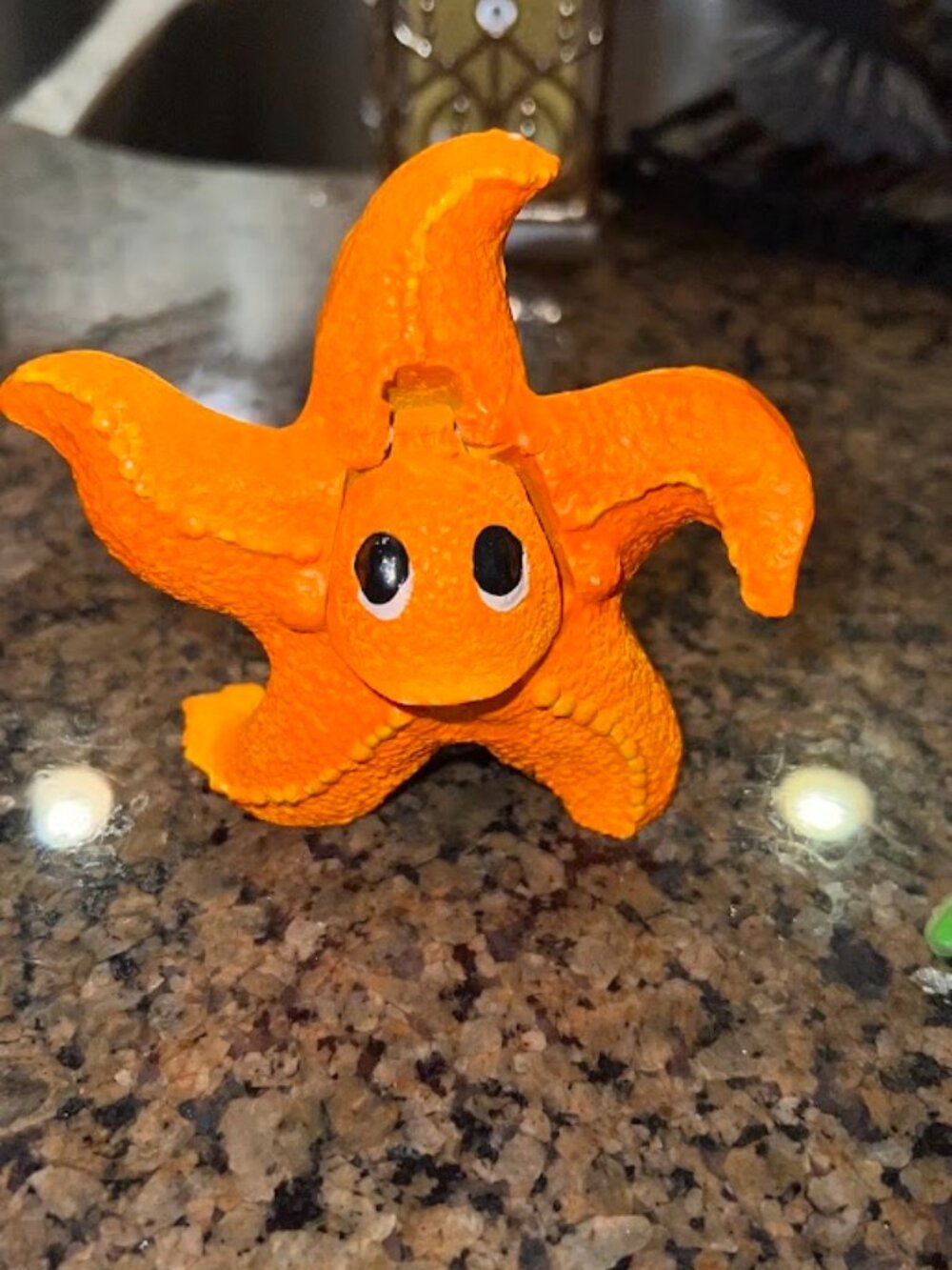 Orange starfish bubbler also known as hydroponics decoration
